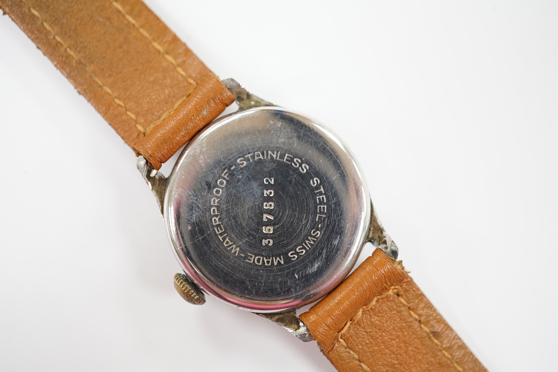 A gentleman's 1940's/1950's stainless steel manual wind wrist watch, with black Arabic dial and subsidiary seconds, on later associated leather strap.